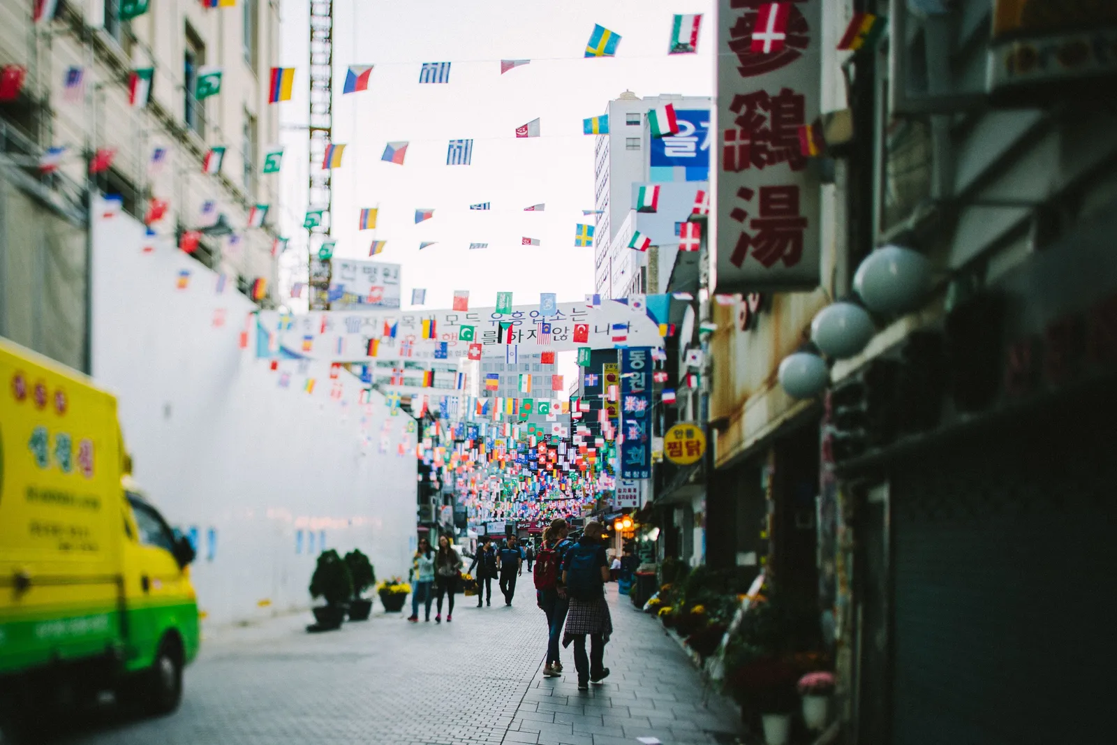 A lane hung with banners and flags in a Seoul neighbourhood, South Korea