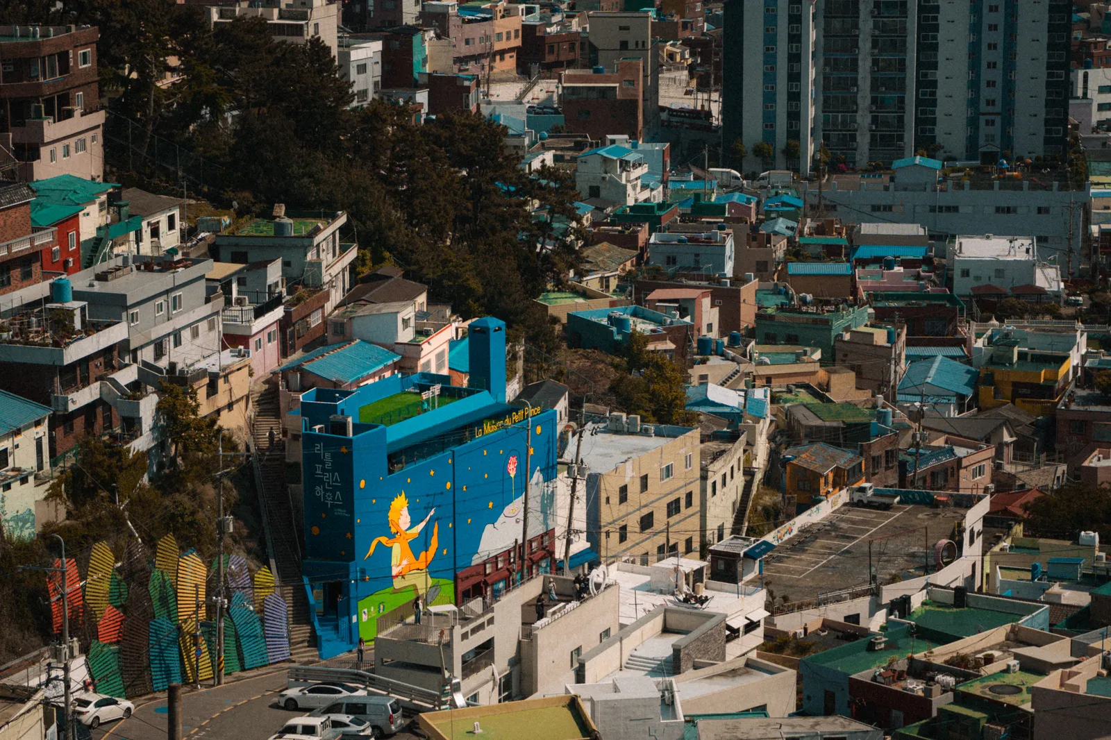 Rows of coloured houses stacked on a hillside above the city in Busan, South Korea