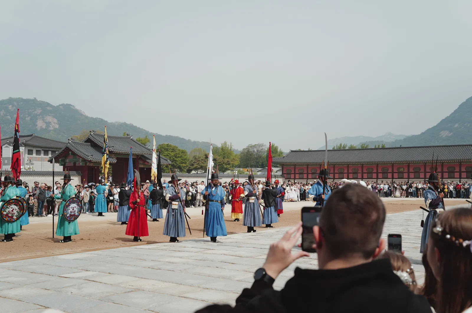The royal guard changing ceremony in period uniforms in the courtyard of Gyeongbokgung Palace, Seoul