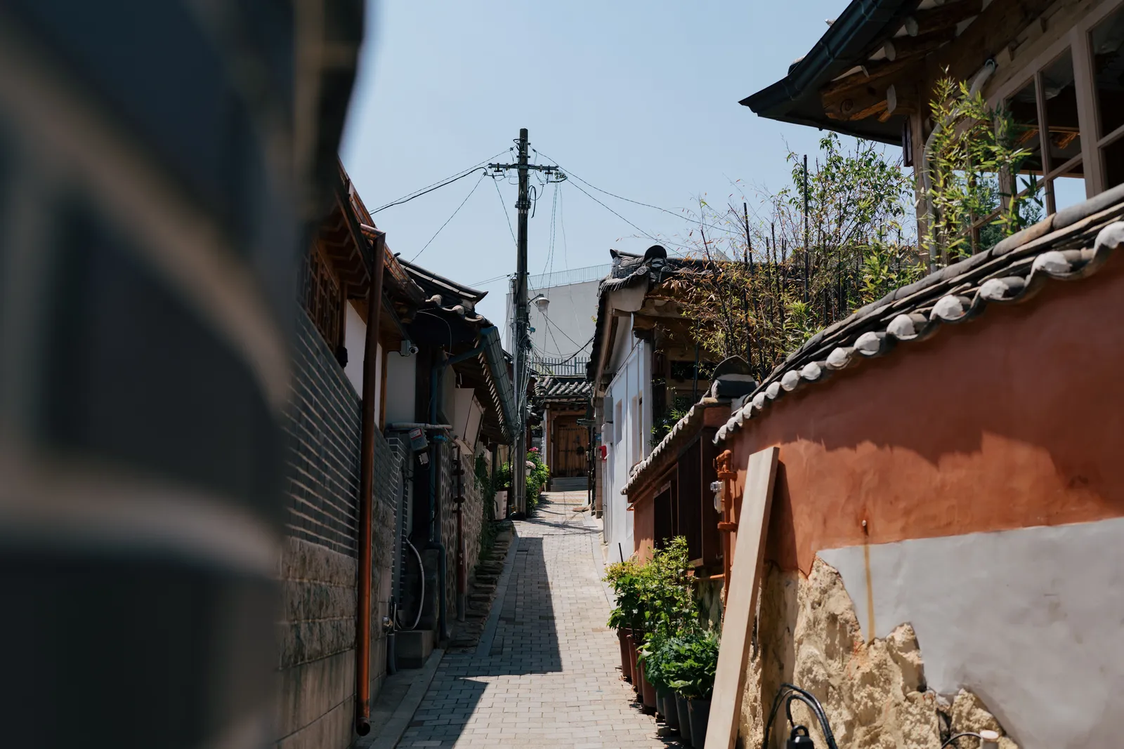 A quiet lane between traditional tiled houses in Jeonju, South Korea