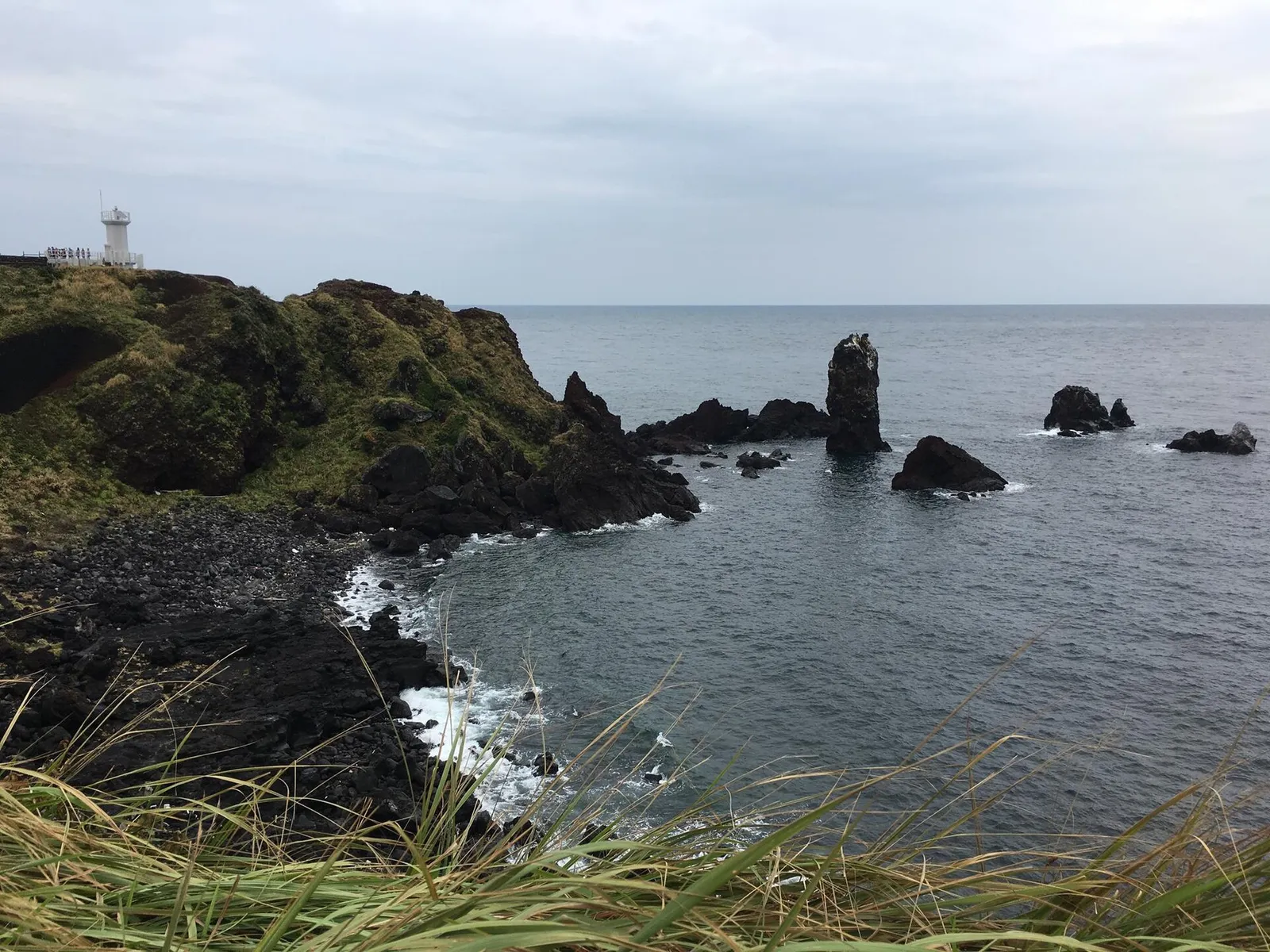 The rocky northeast coast of Jeju Island with the sea in South Korea