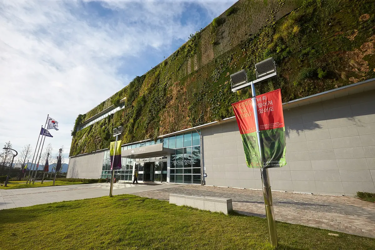 The Museum of Contemporary Art Busan, with its living wall and banners at the front